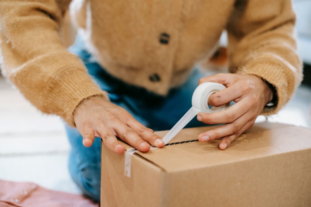 Professional movers carefully packing a piano for safe transport in Dubai